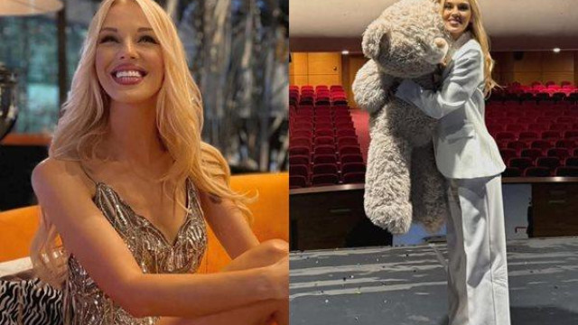 Прегърнала огромно мече и усмихната до уши на сцената на